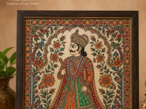 Handpainted Mithila art painting depicting the Maharaja of Janakpur in royal attire with intricate floral Madhubani motifs and premium wooden framing.