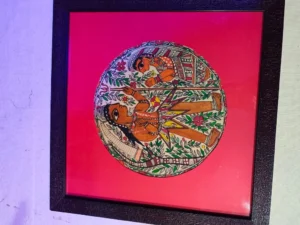 Traditional Mithila couple painting with floral Madhubani patterns