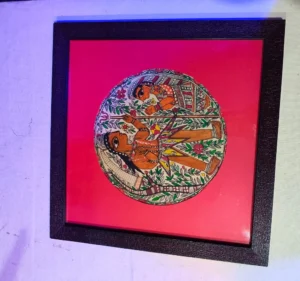 Traditional Mithila couple painting with floral Madhubani patterns